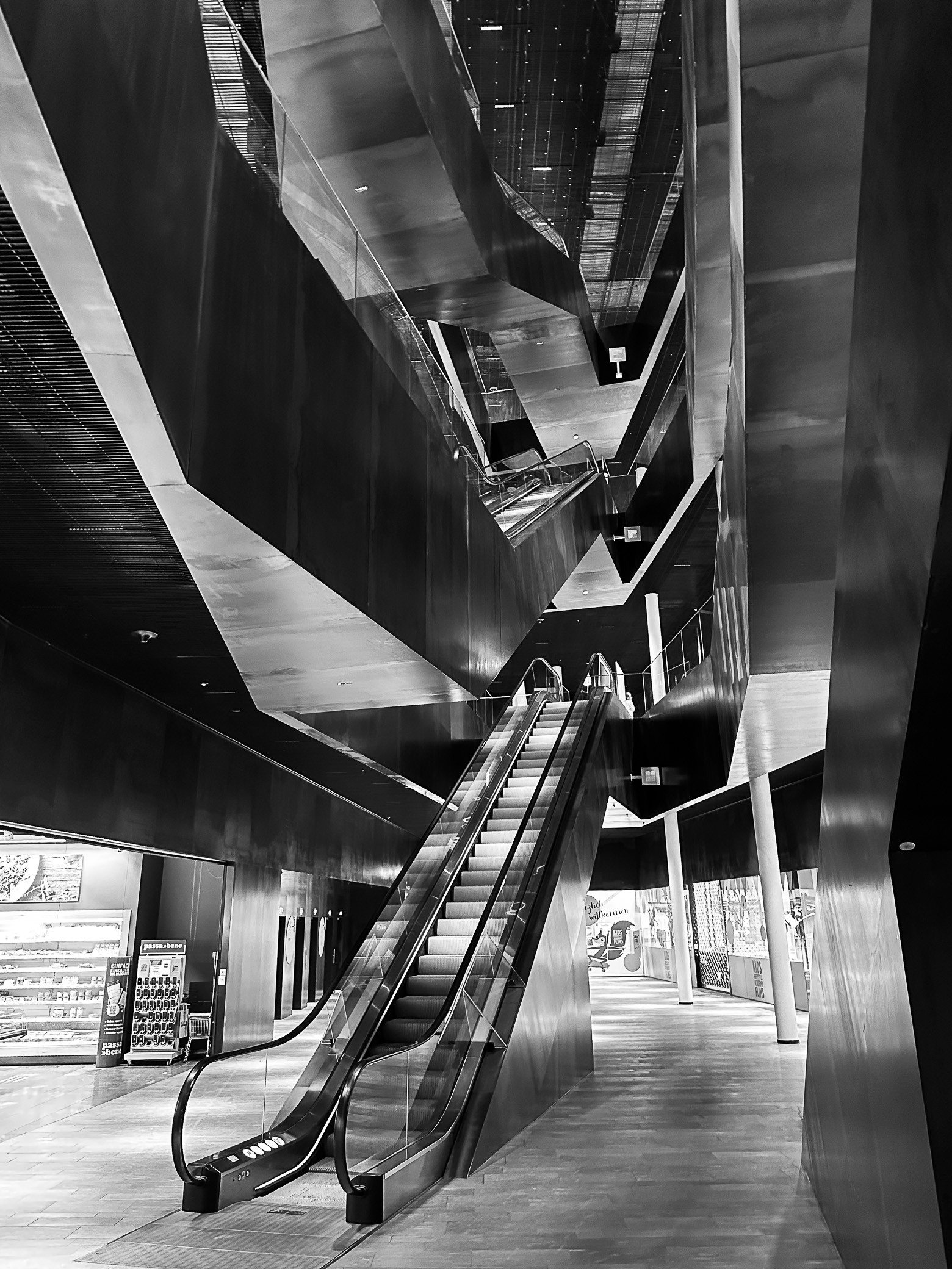 solation - empty escalators in a deserted high tech mall
