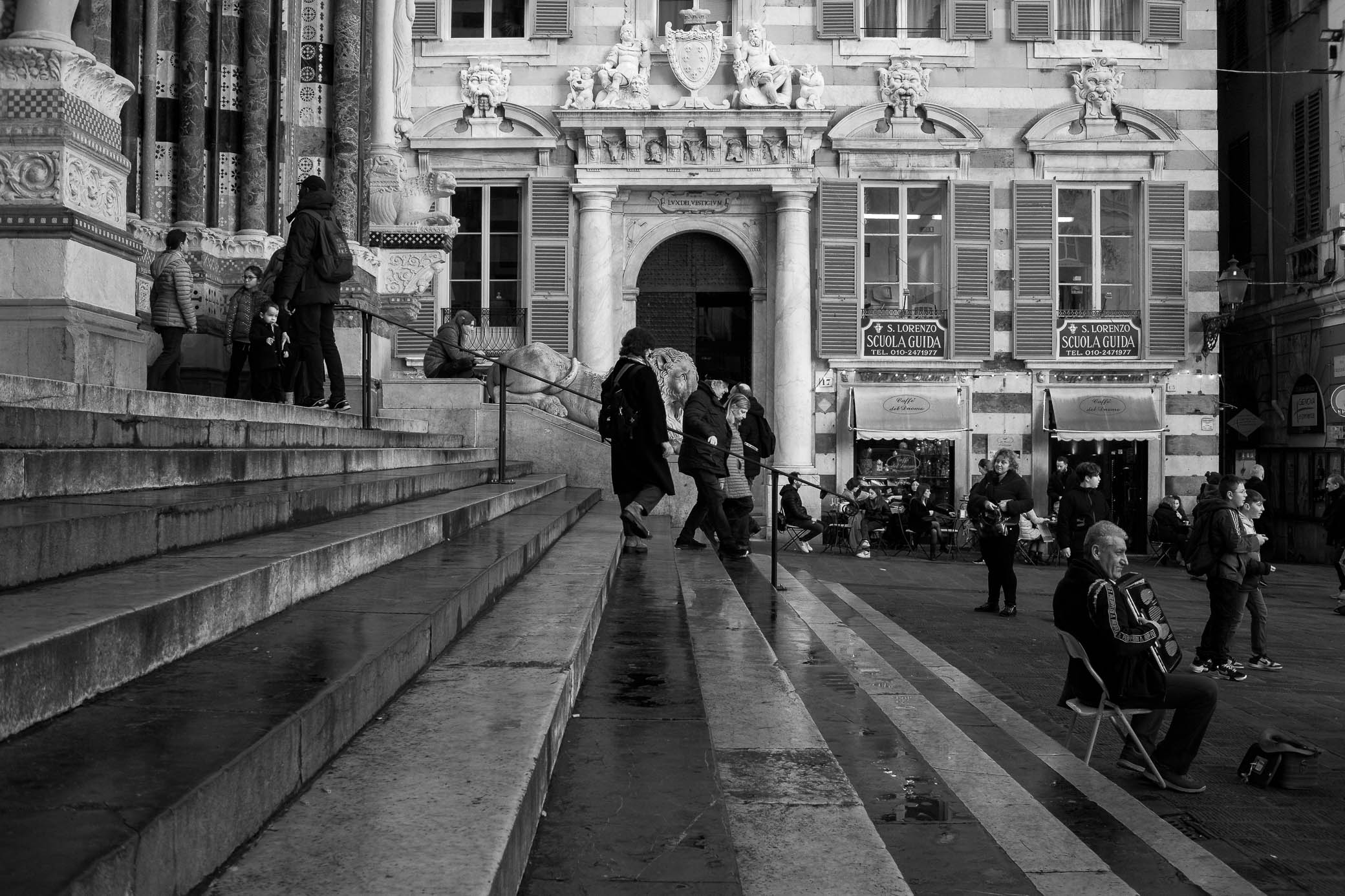 Mable stairs to Genoa's San Lorenzo Cathedral wet from the rain
