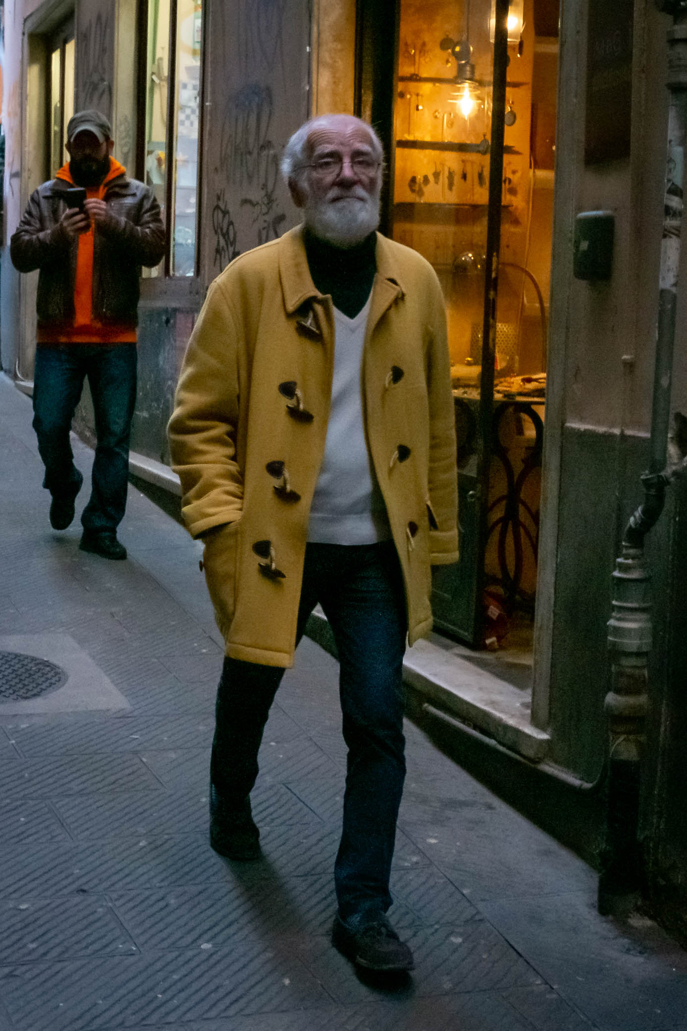 Old man in a yellow coat