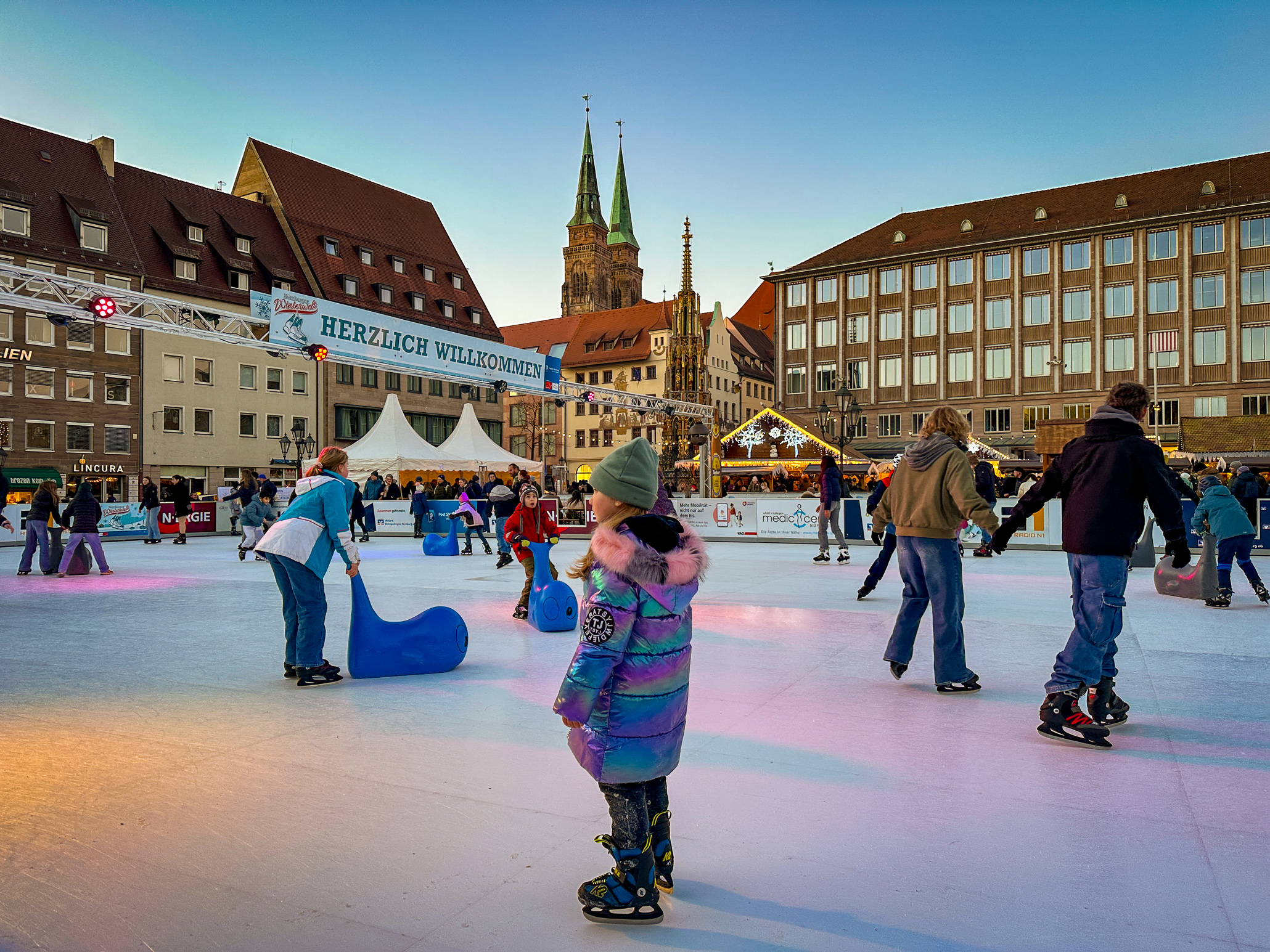 Ice skating little boy